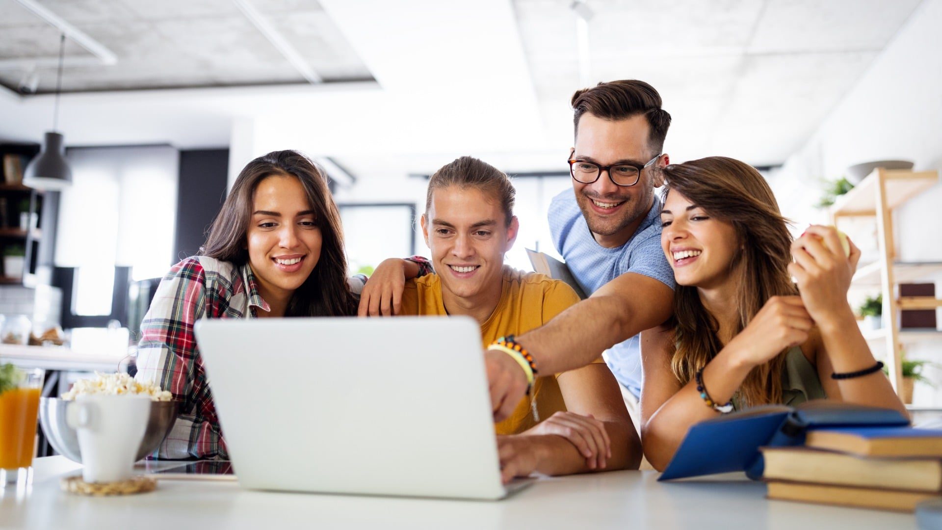 multiracial-young-people-enjoying-group-study-at-table-picture-id1276383007