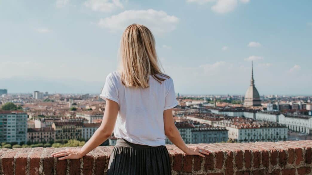 blonde-woman-enjoy-panorama-of-the-turin-amazing-scenic-view-on-mole-picture-id1179047747-1044×587